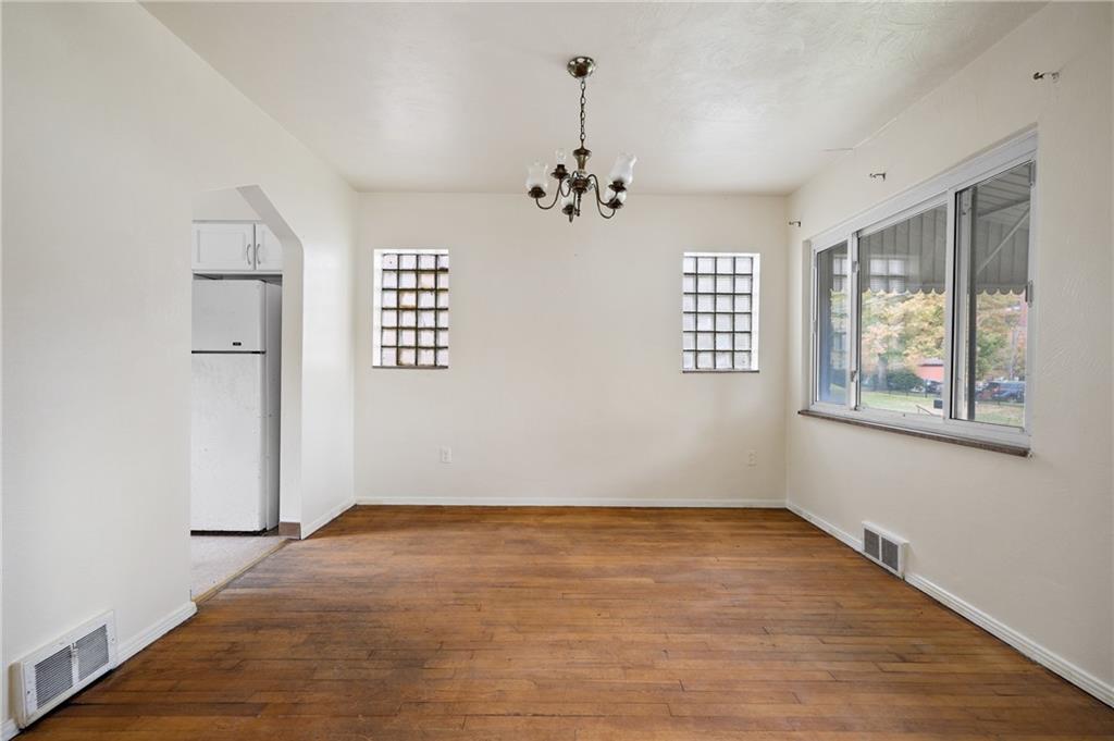 105 Delafield Road Pittsburgh, PA 15215 - Photo 8 of 18 a view of an empty room with a window