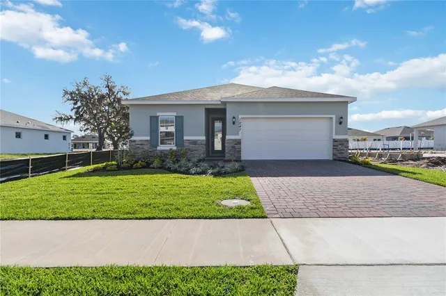a house view with a garden space