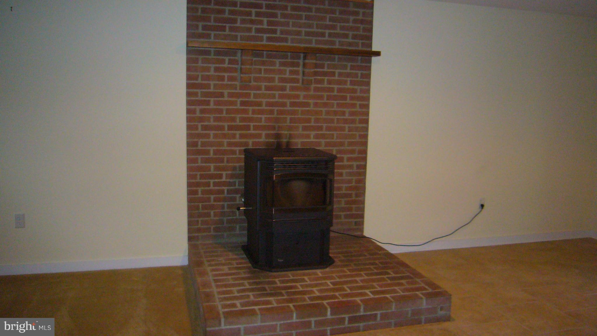 197 Circle Road Pasadena, MD 21122 - Photo 21 of 24 Pellet Stove