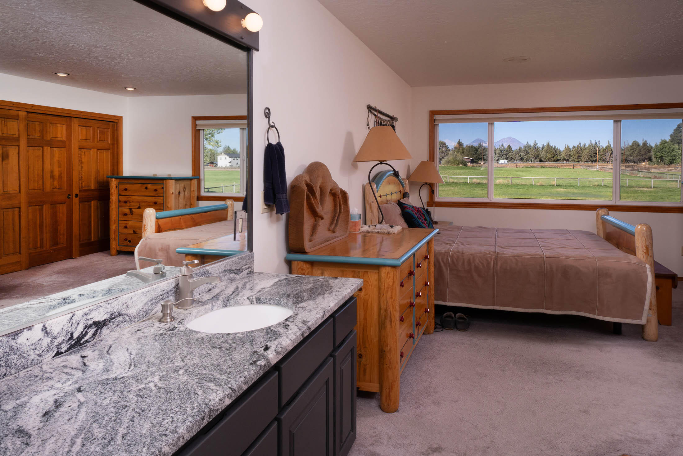 65010 Gerking Market Road Bend, OR 97703 - Photo 27 of 39 Primary suite with Cascade Mountain views
