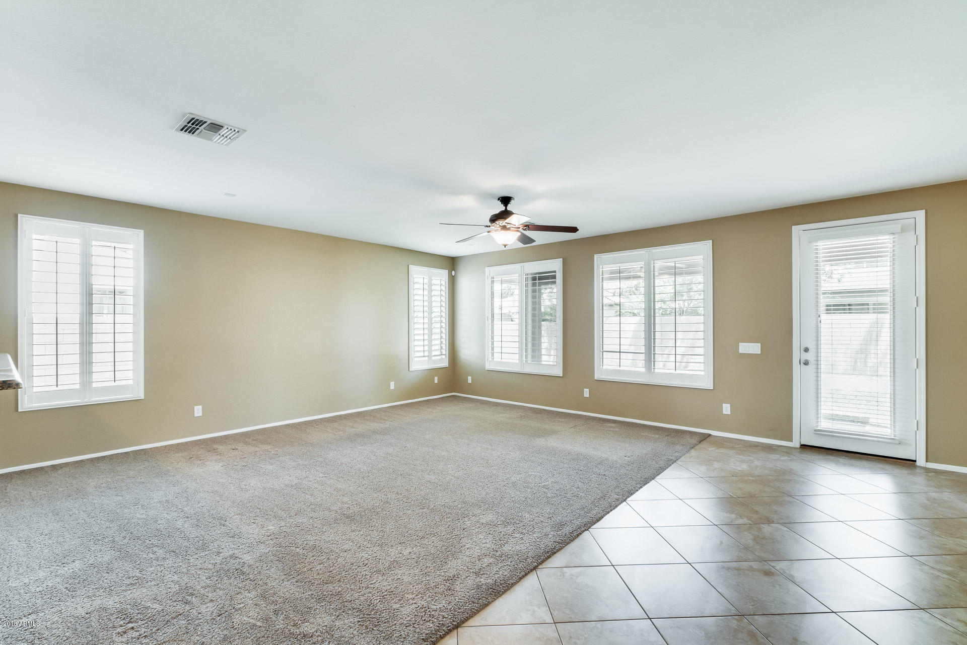 3250 East Blue Ridge Way Gilbert, AZ 85298 - Photo 19 of 44 a view of an empty room with a window