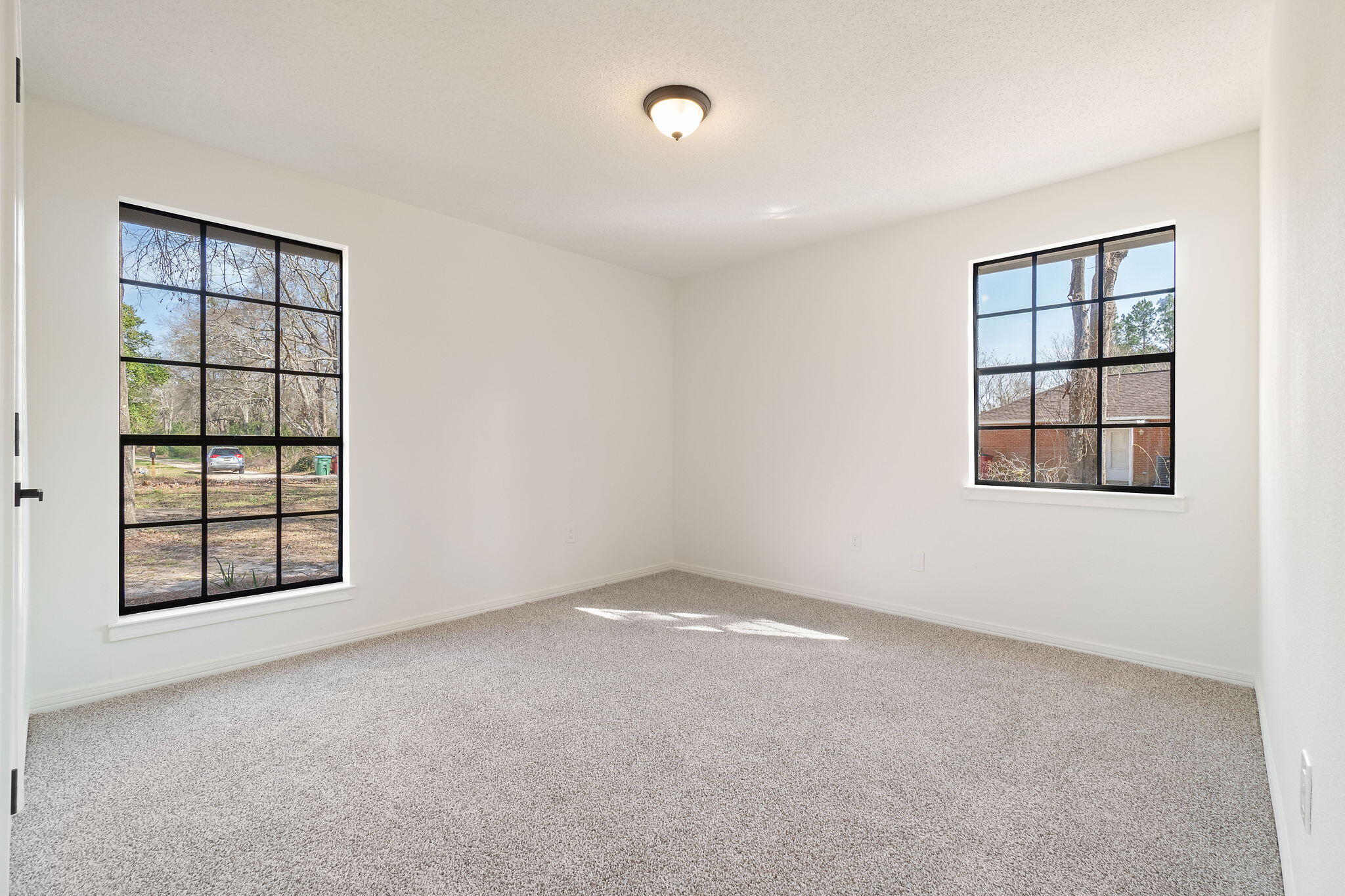 6118 Buckward Road Baker, FL 32531 - Photo 16 of 39 an empty room with windows