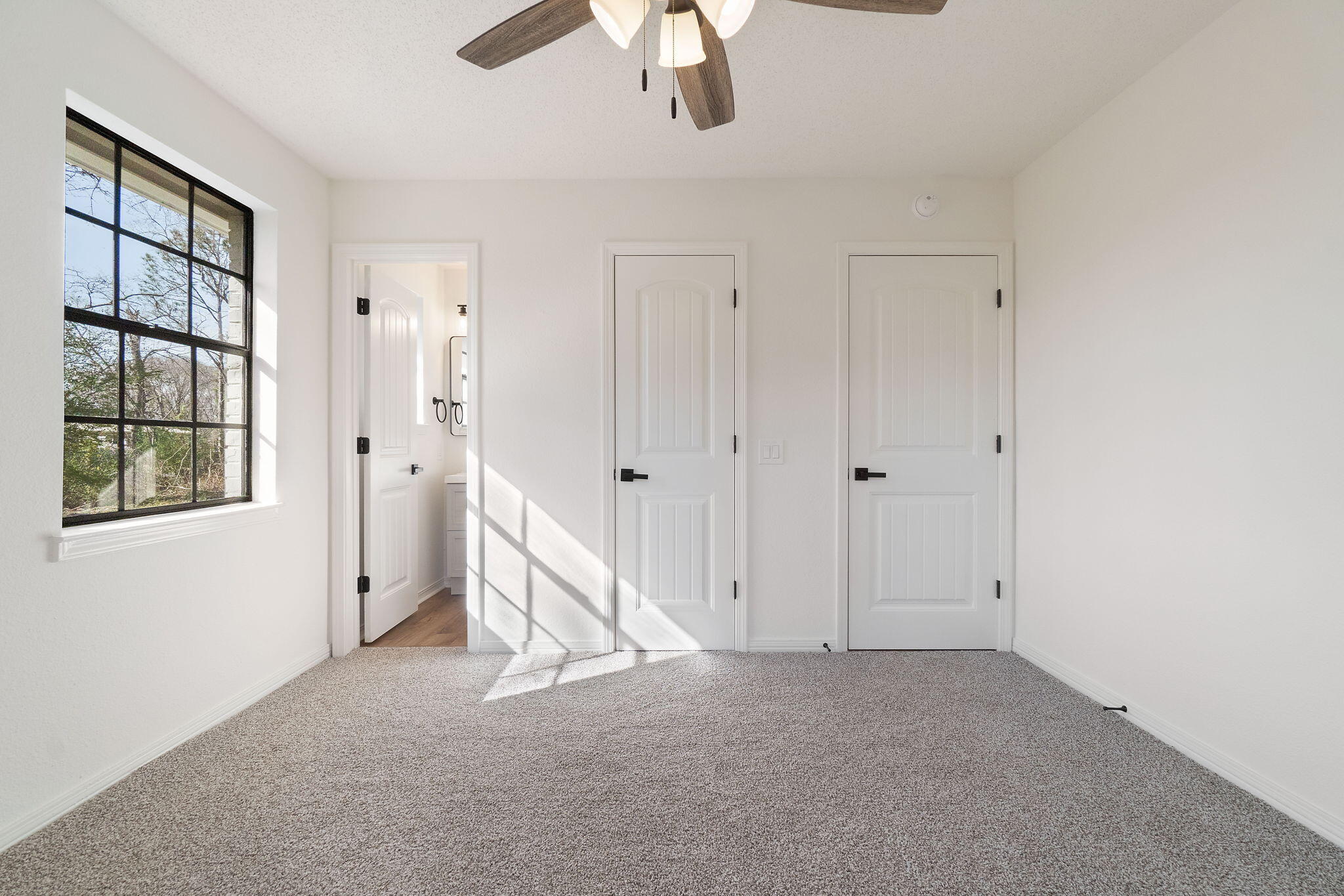 6118 Buckward Road Baker, FL 32531 - Photo 17 of 39 a view of an empty room with a window