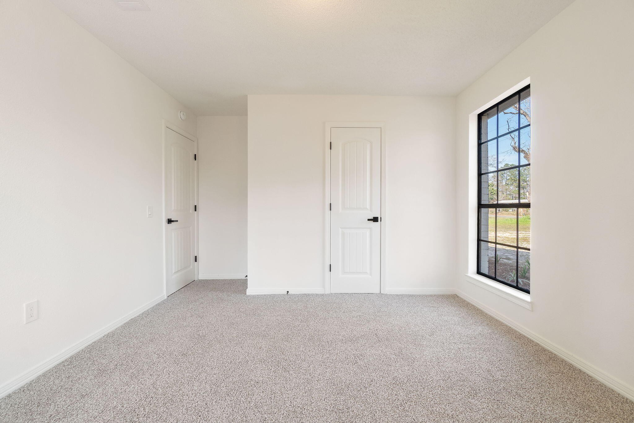6118 Buckward Road Baker, FL 32531 - Photo 20 of 39 a view of an empty room with a window