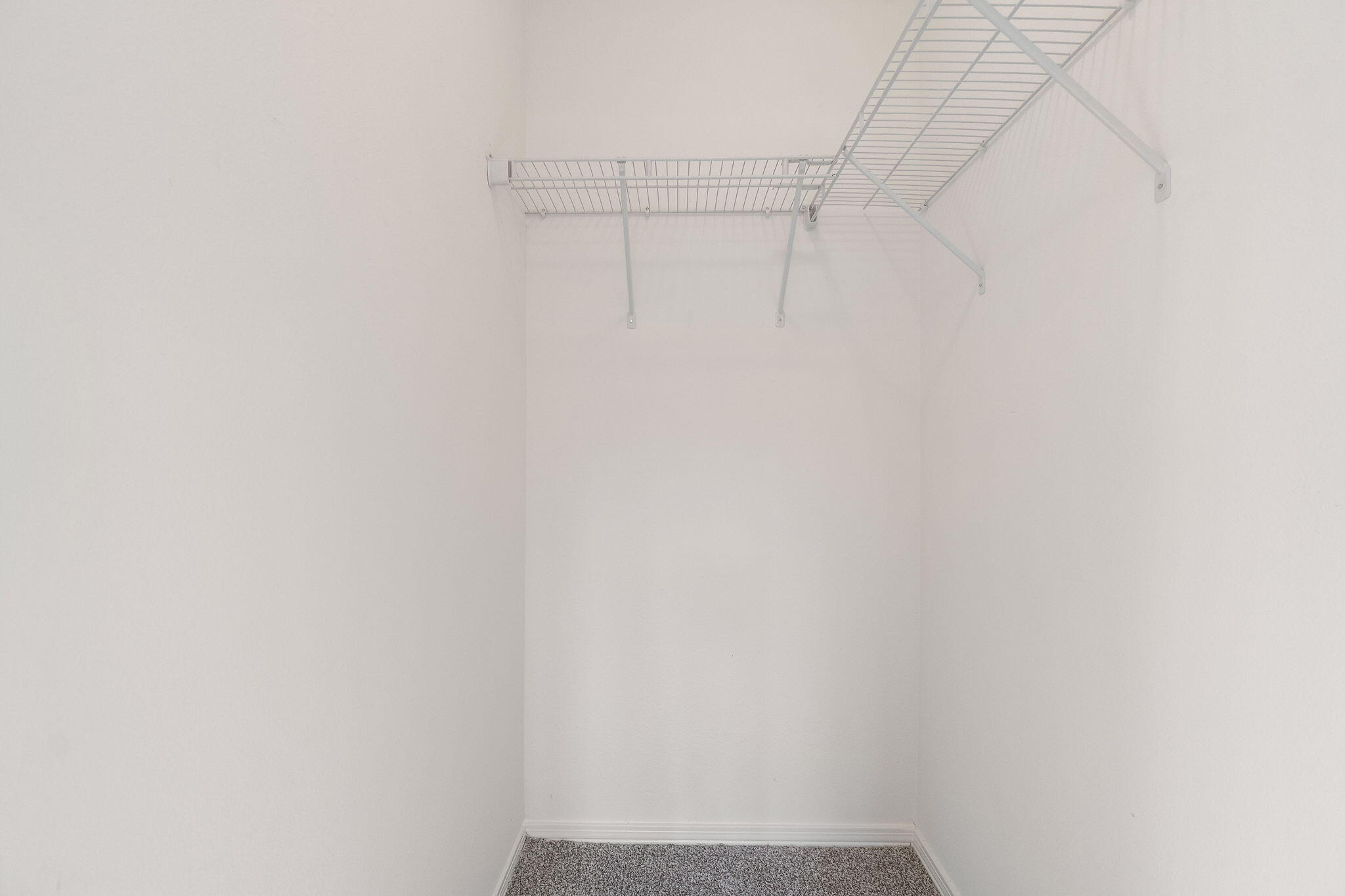 6118 Buckward Road Baker, FL 32531 - Photo 23 of 39 a view of small space with racks on the wall