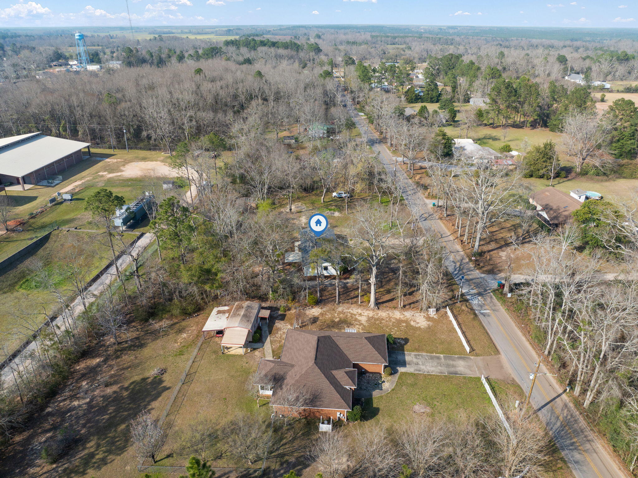 6118 Buckward Road Baker, FL 32531 - Photo 33 of 39 an aerial view of a house with a yard