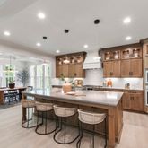 a kitchen with lots of counter space and dining table