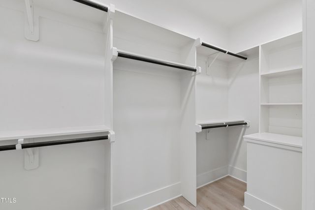 a view of a hallway with windows