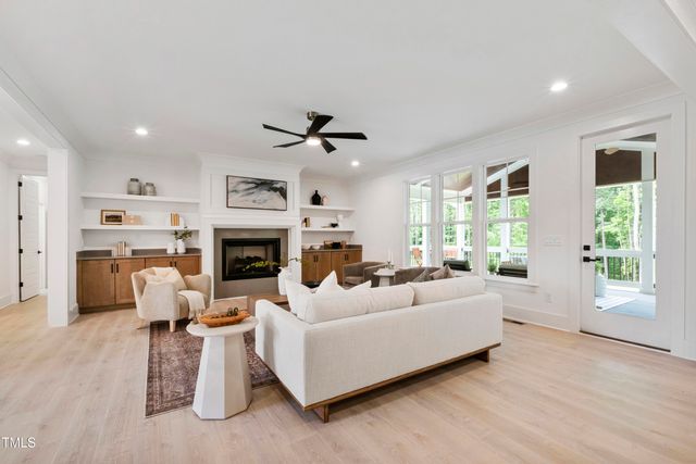 a view of entryway livingroom and hall