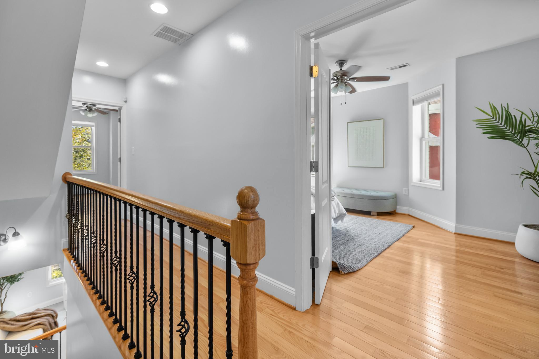 3916 5th Street Northwest Washington, DC 20011 - Photo 19 of 51 a view of a hallway view with wooden floor and staircase