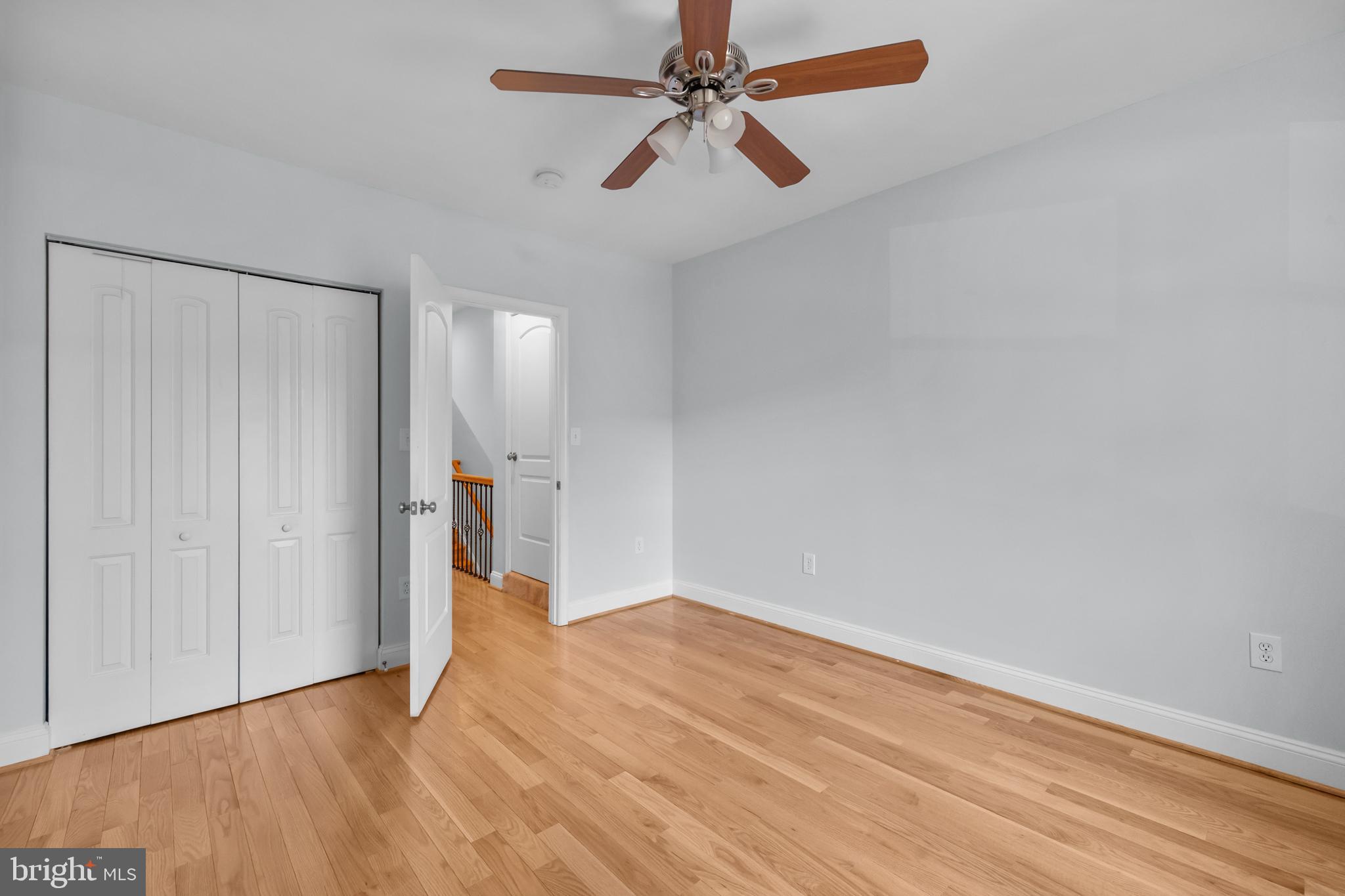 3916 5th Street Northwest Washington, DC 20011 - Photo 25 of 51 an empty room with closet and a ceiling fan