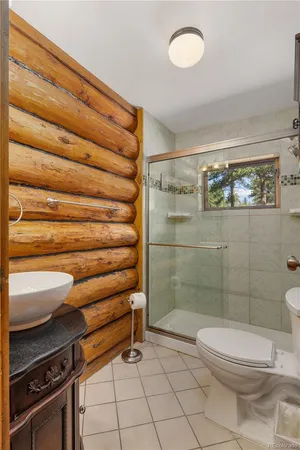 a living room with furniture and a gate