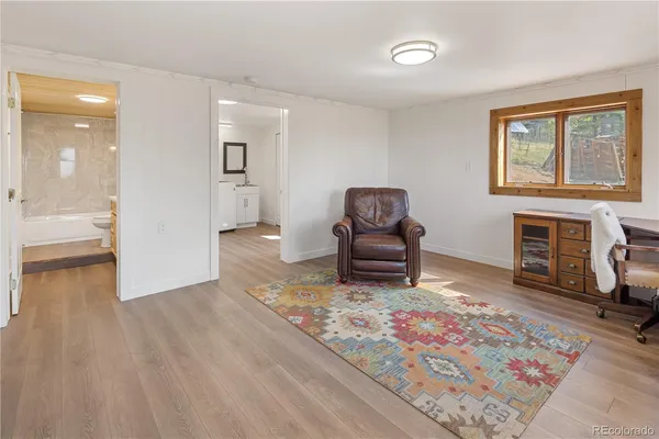 a bathroom with a sink a toilet and a bathtub