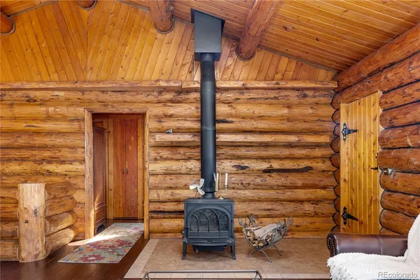 a view of entryway with wooden door