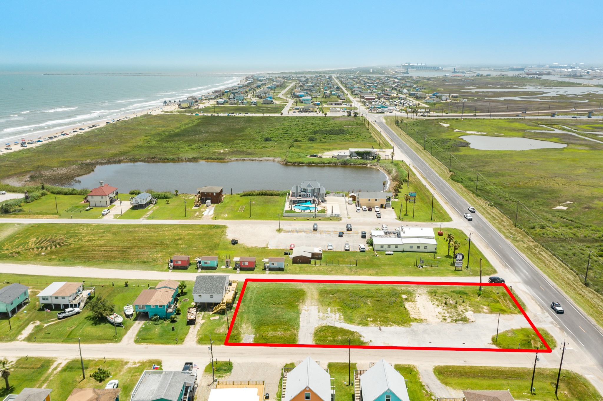 323 Ocean Avenue Surfside Beach, TX 77541 - Photo 15 of 16 a view of swimming pool with an ocean view