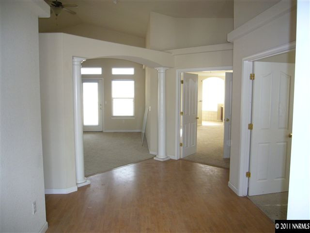 1880 Heidi Road Fallon, NV 89406 - Photo 3 of 13 an empty room with windows and closet