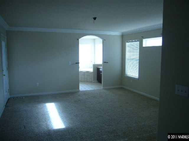 1880 Heidi Road Fallon, NV 89406 - Photo 6 of 13 an empty room with a window