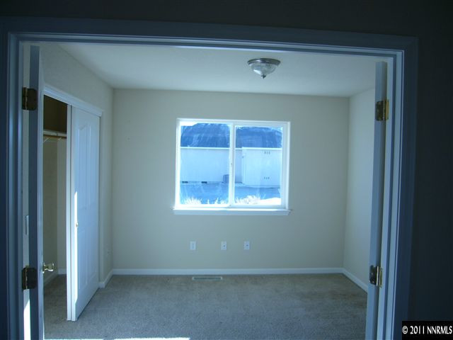 1880 Heidi Road Fallon, NV 89406 - Photo 9 of 13 a view of an empty room with a window