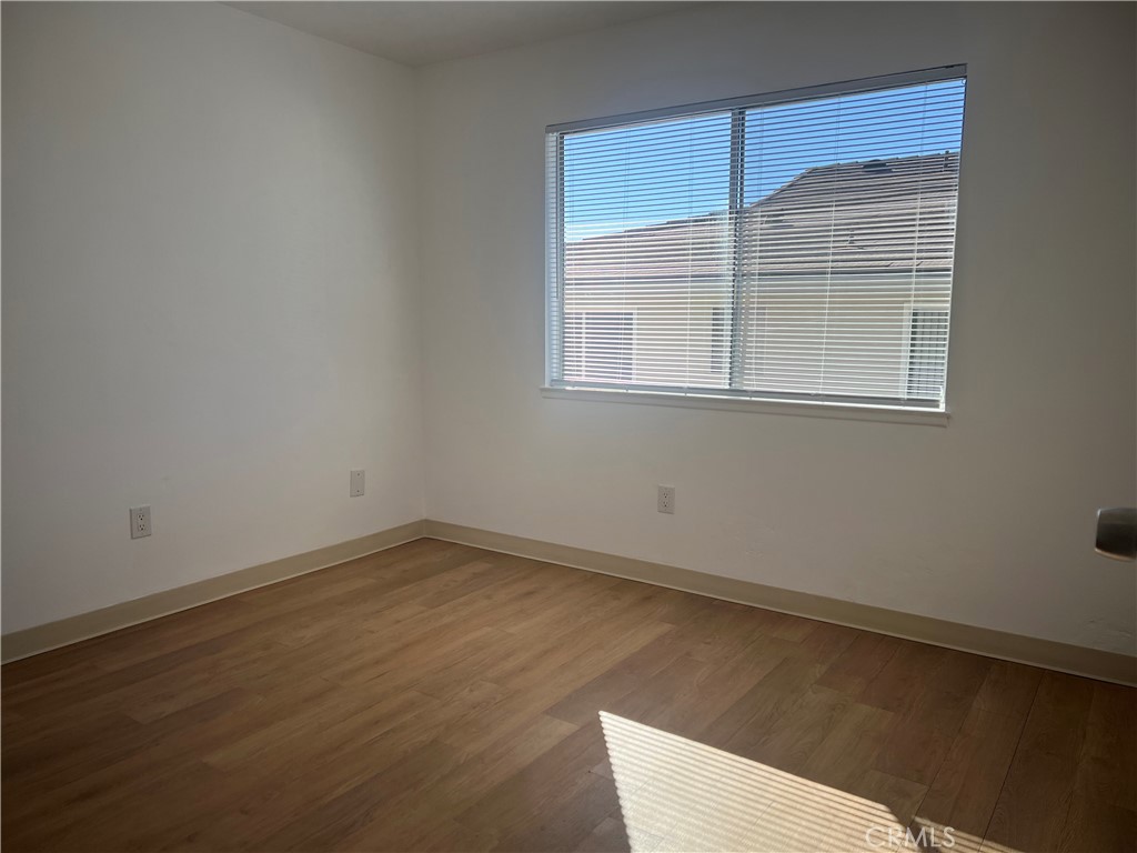 3535 20th Street Highland, CA 92346 - Photo 12 of 14 an empty room with a window