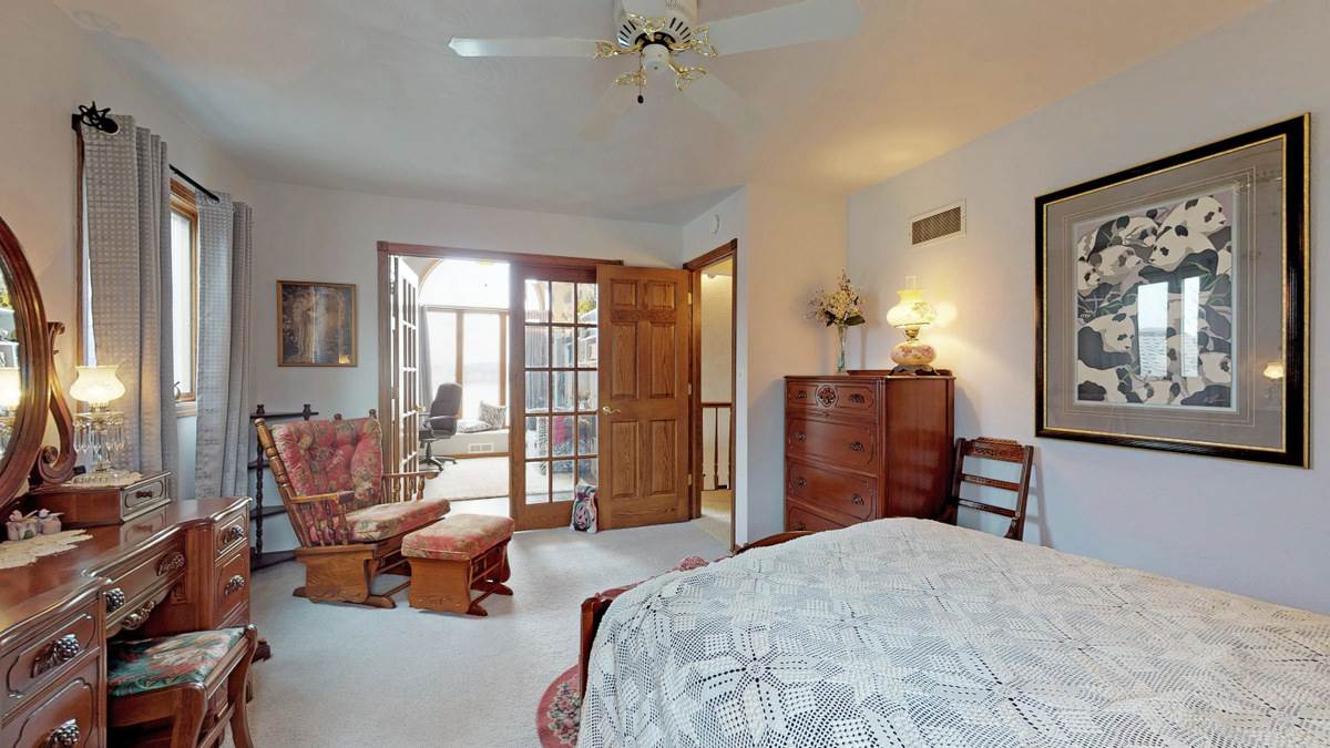 532 Baintree Road Lake Summerset, IL 61019 - Photo 18 of 25 a bedroom with a bed dresser and a window