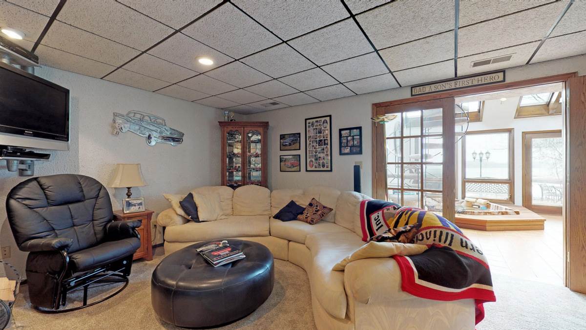 532 Baintree Road Lake Summerset, IL 61019 - Photo 23 of 25 a living room with furniture and a flat screen tv