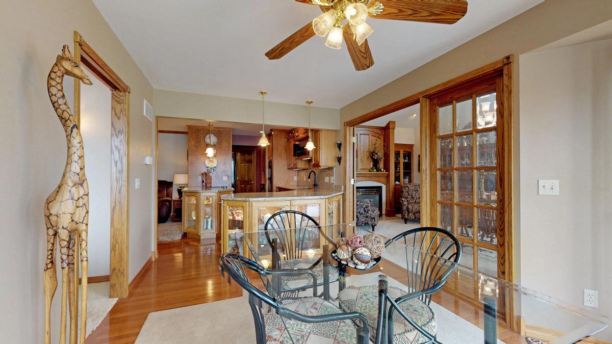 532 Baintree Road Lake Summerset, IL 61019 - Photo 24 of 25 a view of a livingroom with furniture window and a chandelier