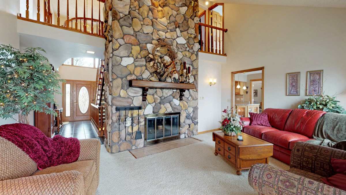 532 Baintree Road Lake Summerset, IL 61019 - Photo 4 of 25 a living room with furniture and a fireplace