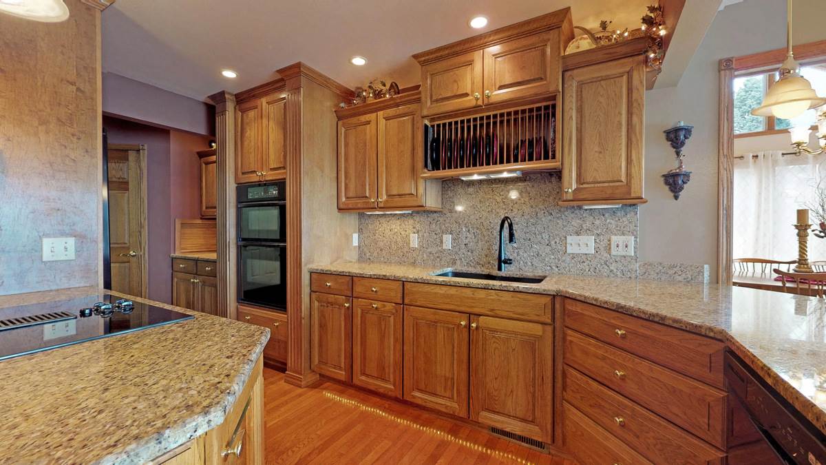 532 Baintree Road Lake Summerset, IL 61019 - Photo 7 of 25 a kitchen with stainless steel appliances granite countertop a sink stove and refrigerator