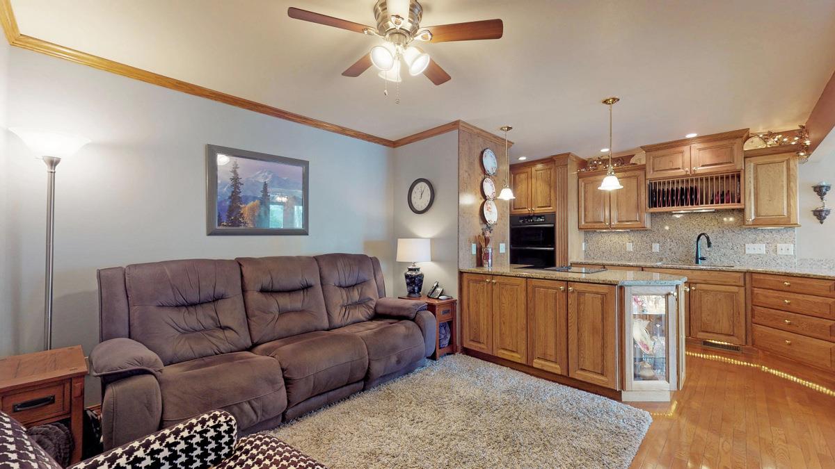 532 Baintree Road Lake Summerset, IL 61019 - Photo 9 of 25 a living room with furniture a dining table and kitchen view