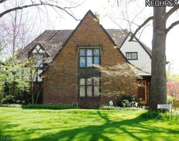2889 Torrington Road Beachwood, OH 44122 - Photo 1 of 25 Sidehall Tudor with leaded-glass windows and exterior architectural detail.