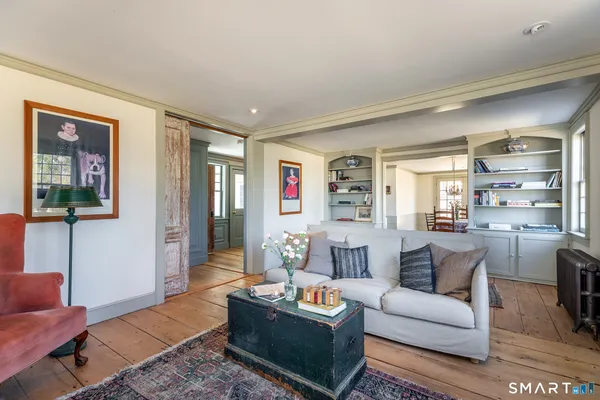 a living room with furniture and a window