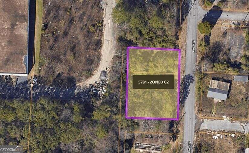 2625 Pine Avenue Macon, GA 31206 - Photo 1 of 1 a sign that is sitting on a brick wall