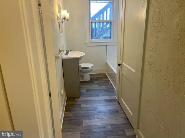a bathroom with a sink and a toilet