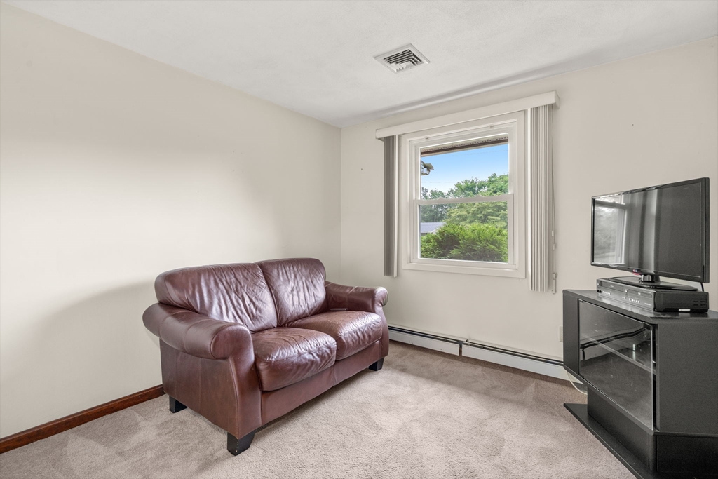 6 Paulette Drive Danvers, MA 01923 - Photo 19 of 35 a living room with furniture and a window