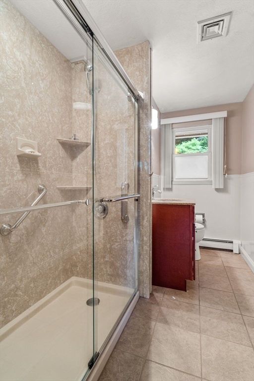 6 Paulette Drive Danvers, MA 01923 - Photo 27 of 35 a bathroom with a bathtub and a shower