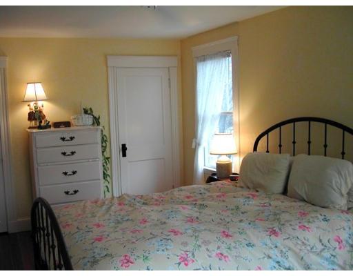 885 Webster Street Needham, MA 02492 - Photo 13 of 27 a bedroom with a bed and a dresser
