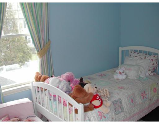 885 Webster Street Needham, MA 02492 - Photo 15 of 27 a bedroom with a bed and a window