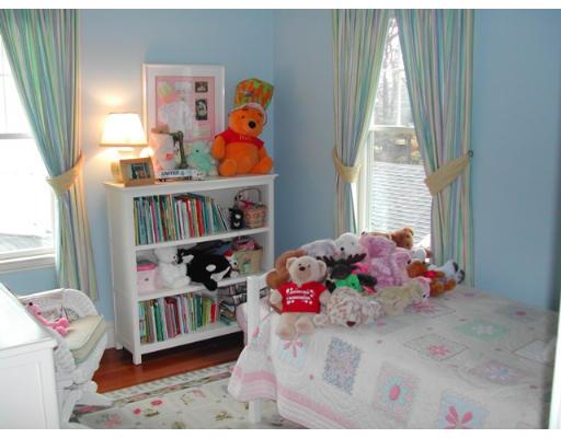 885 Webster Street Needham, MA 02492 - Photo 16 of 27 a bedroom with toys and a book shelf