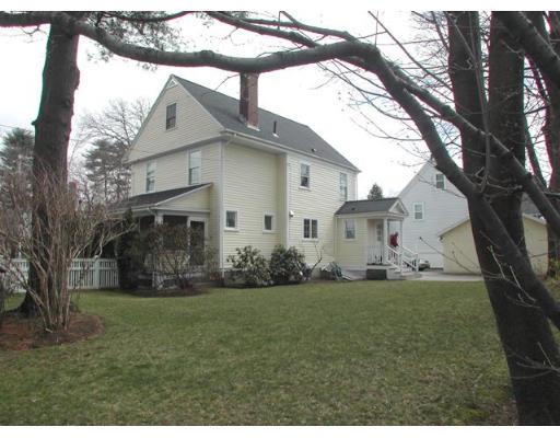885 Webster Street Needham, MA 02492 - Photo 2 of 27 a front view of house with yard