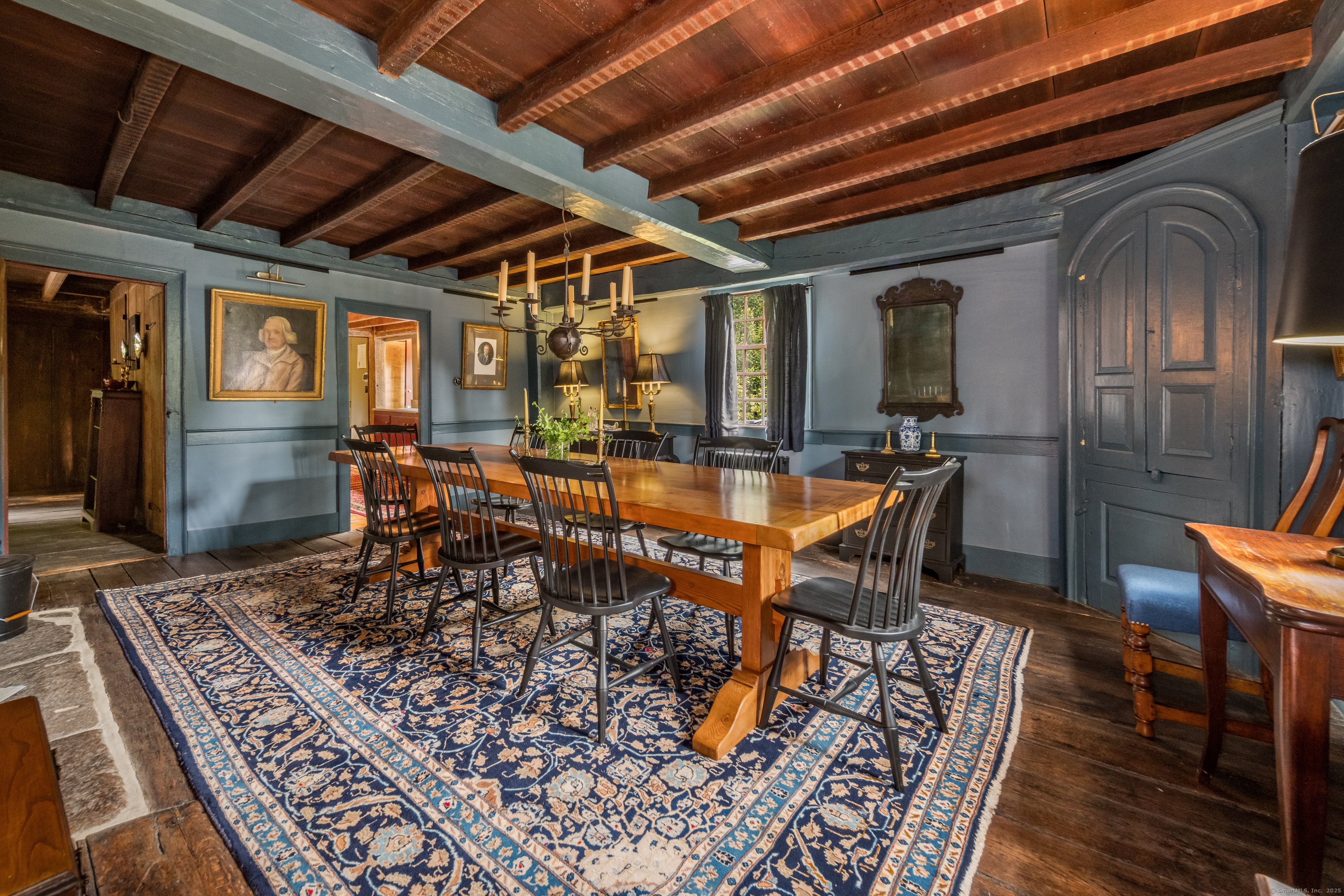 575 Leetes Island Road Guilford, CT 06437 - Photo 15 of 39 a dining room with furniture window and wooden floor