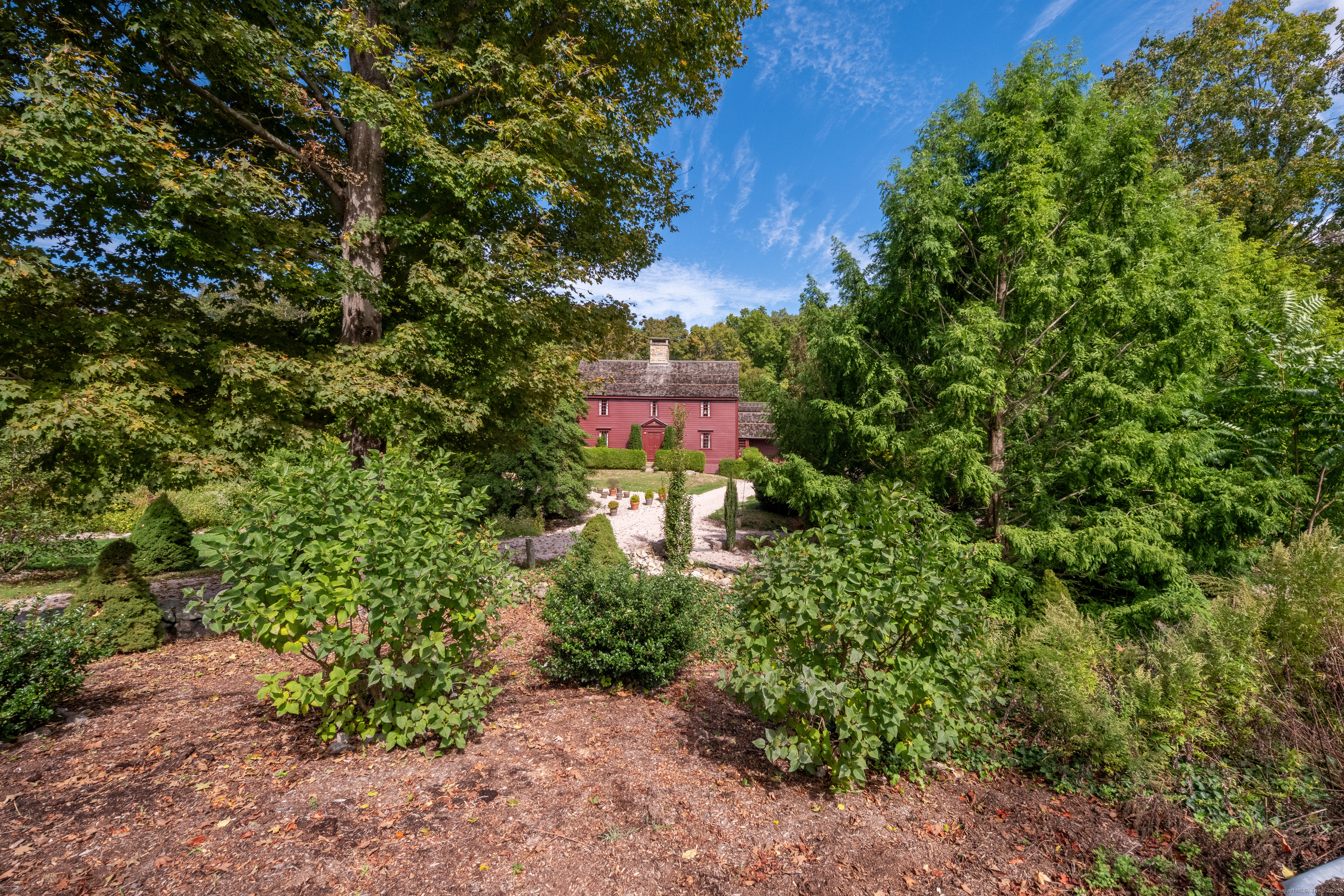 575 Leetes Island Road Guilford, CT 06437 - Photo 34 of 39 a view of a house with a tree