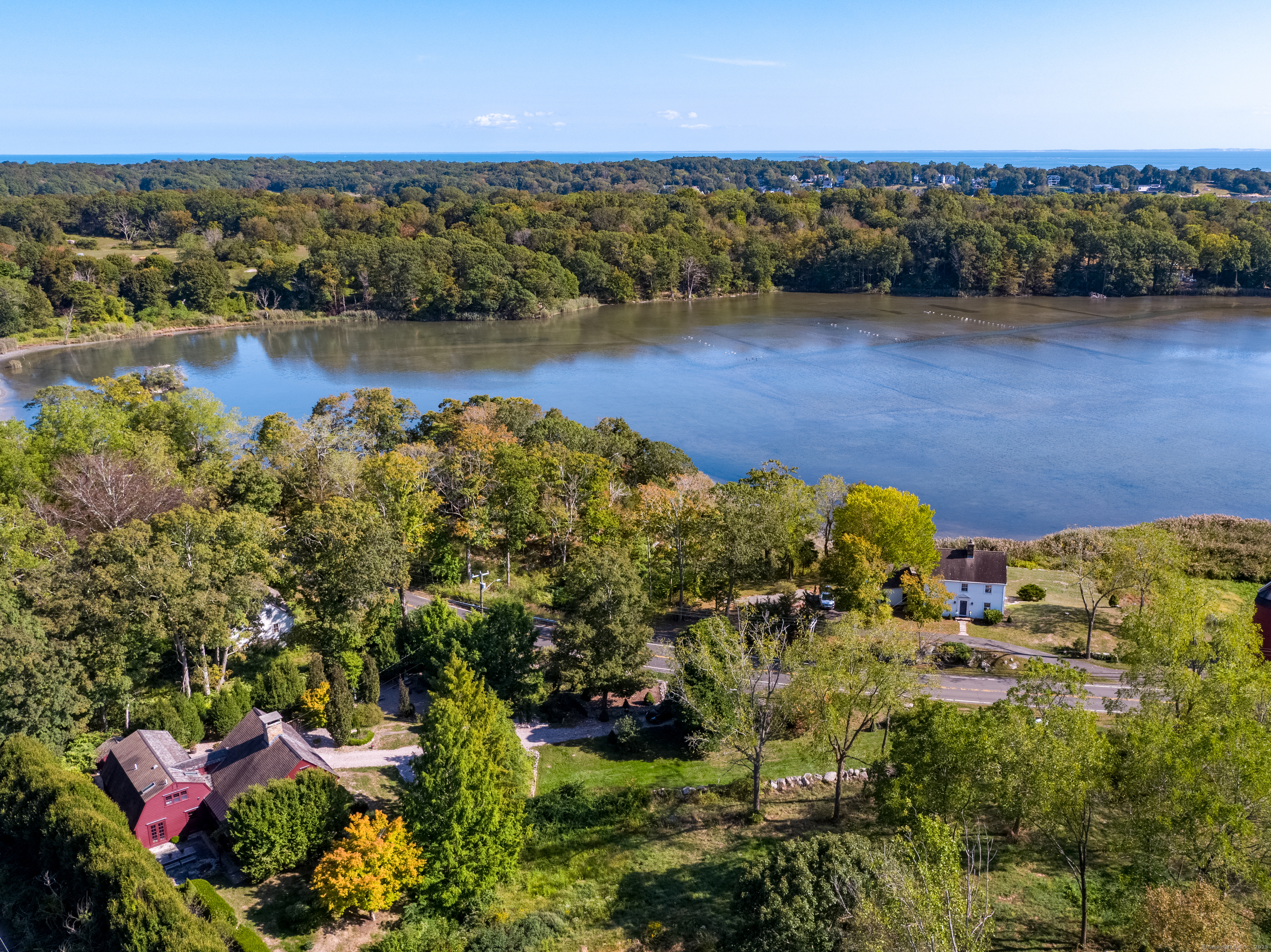 575 Leetes Island Road Guilford, CT 06437 - Photo 37 of 39 a view of a lake with houses