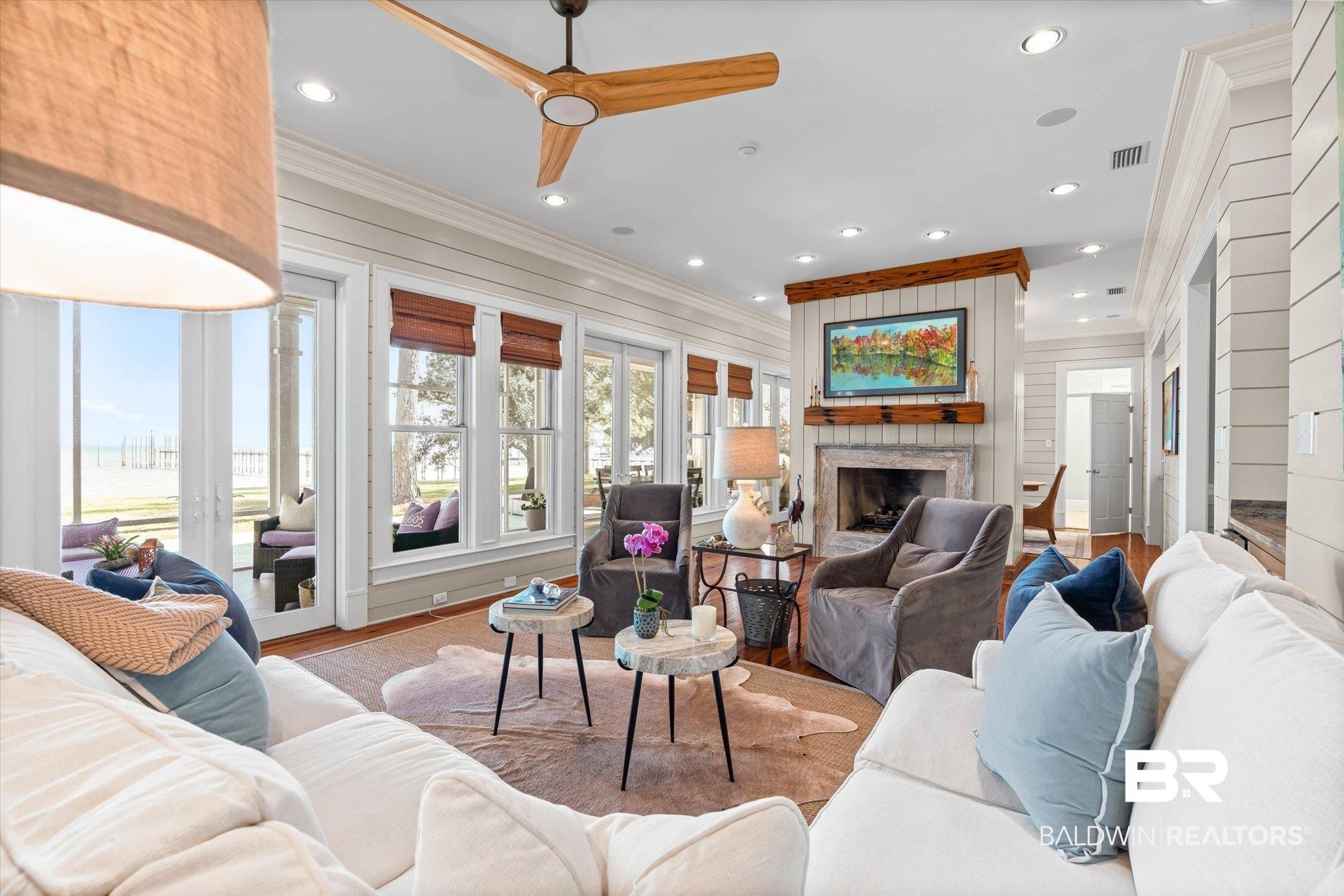 7015 Bay Road Mobile, AL 36605 - Photo 16 of 53 Living room with ornamental molding, a ceiling fan, a fireplace, wood finished floors, and recessed lighting
