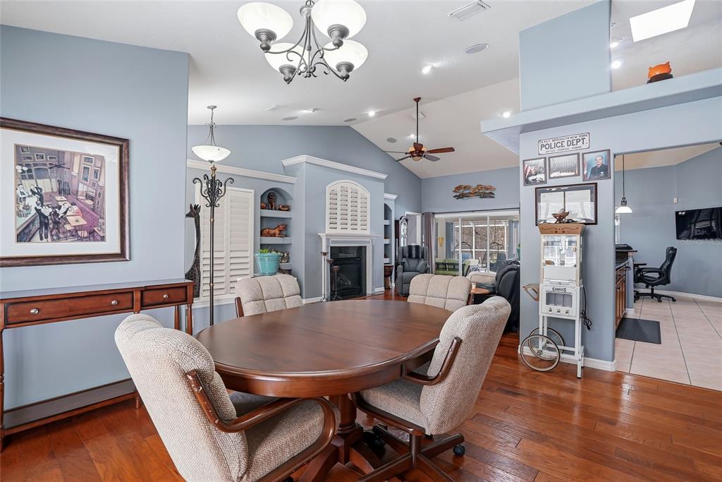 296 North Quartz Avenue Hernando, FL 34442 - Photo 12 of 66 a view of a dining room with furniture wooden floor and chandelier