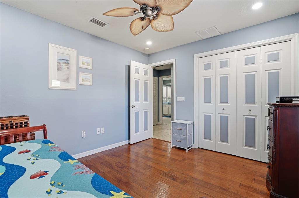 296 North Quartz Avenue Hernando, FL 34442 - Photo 33 of 66 a bedroom with furniture and wooden floor