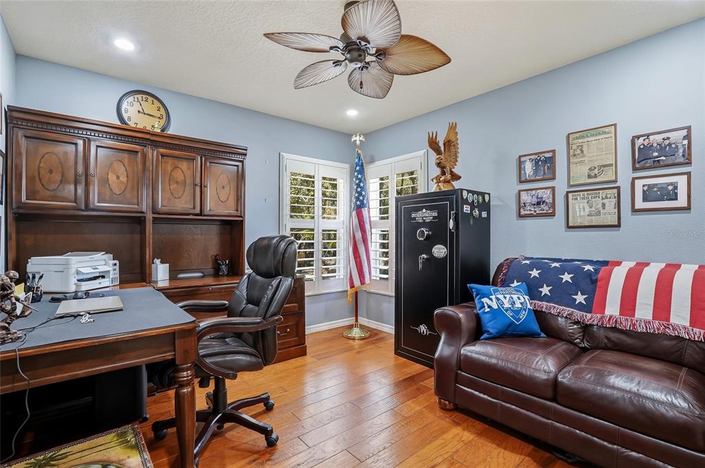 296 North Quartz Avenue Hernando, FL 34442 - Photo 36 of 66 a living room with furniture and a chandelier