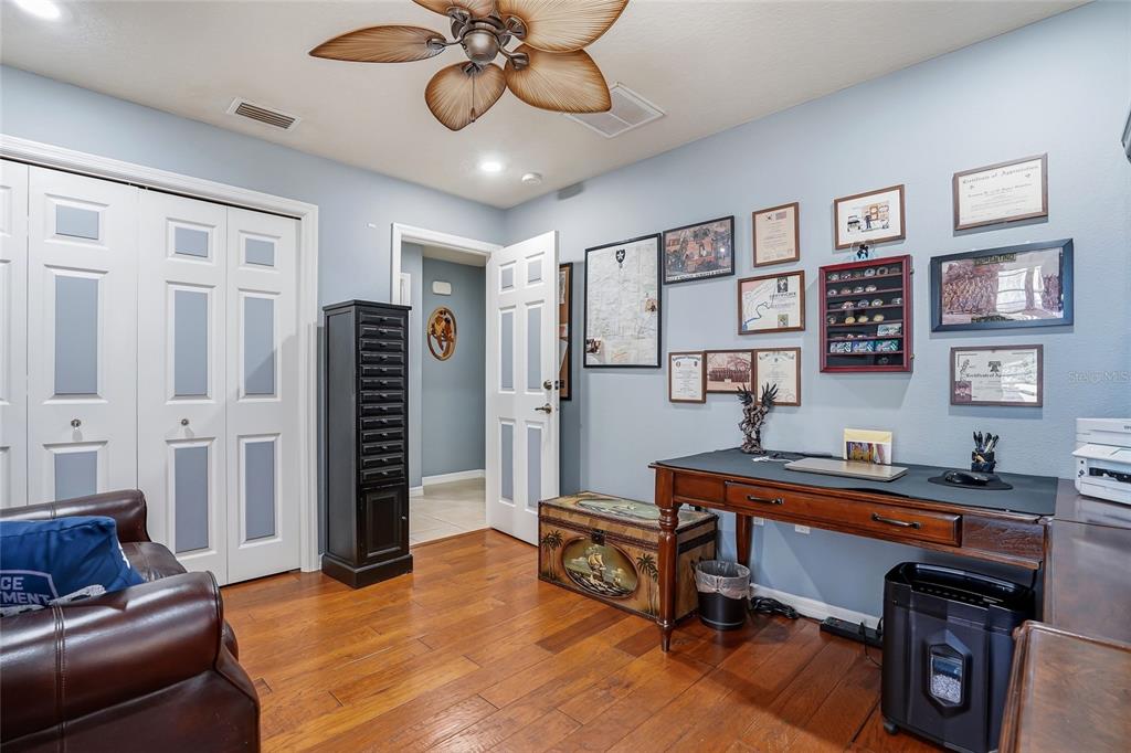 296 North Quartz Avenue Hernando, FL 34442 - Photo 37 of 66 a living room with furniture and a chandelier