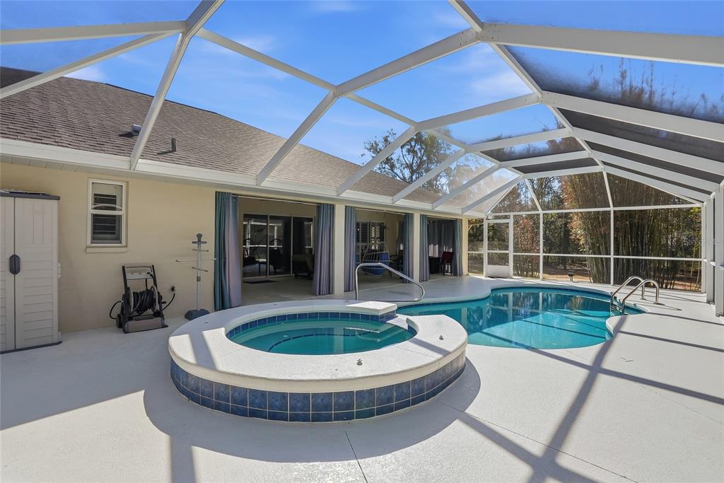 296 North Quartz Avenue Hernando, FL 34442 - Photo 40 of 66 a view of a house with a swimming pool