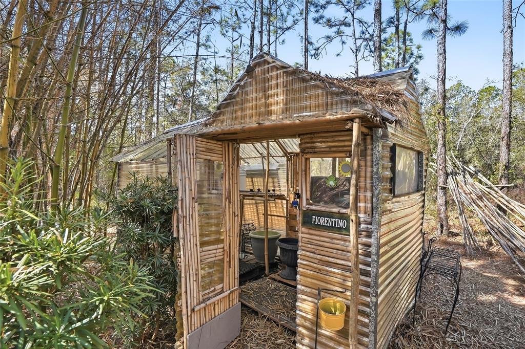 296 North Quartz Avenue Hernando, FL 34442 - Photo 59 of 66 a front view of a house with a yard