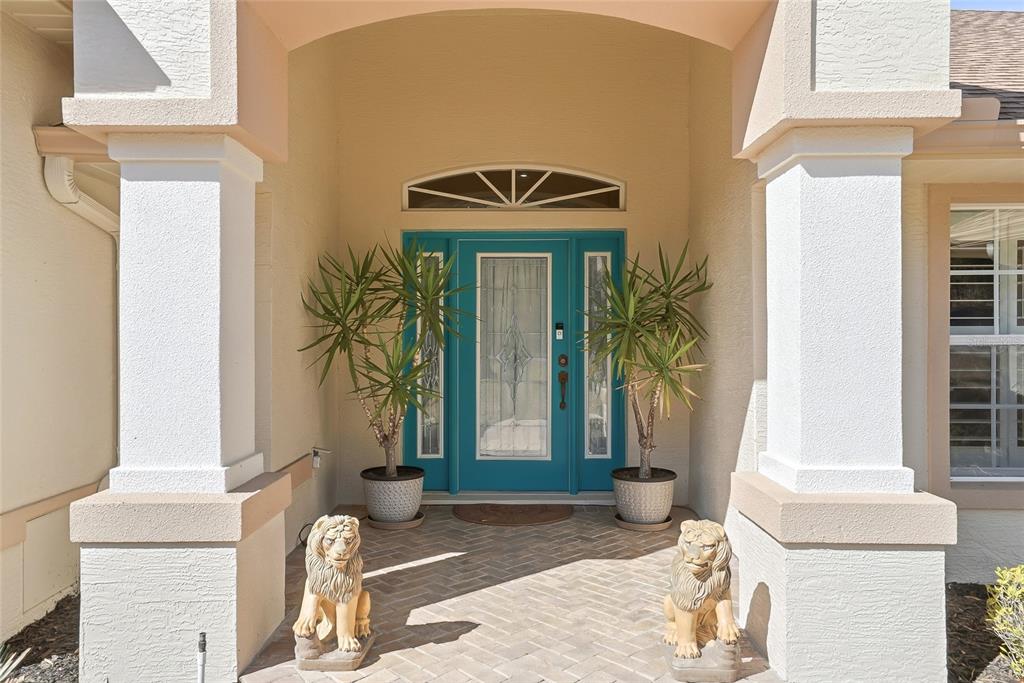 296 North Quartz Avenue Hernando, FL 34442 - Photo 9 of 66 a front view of a house with a yard